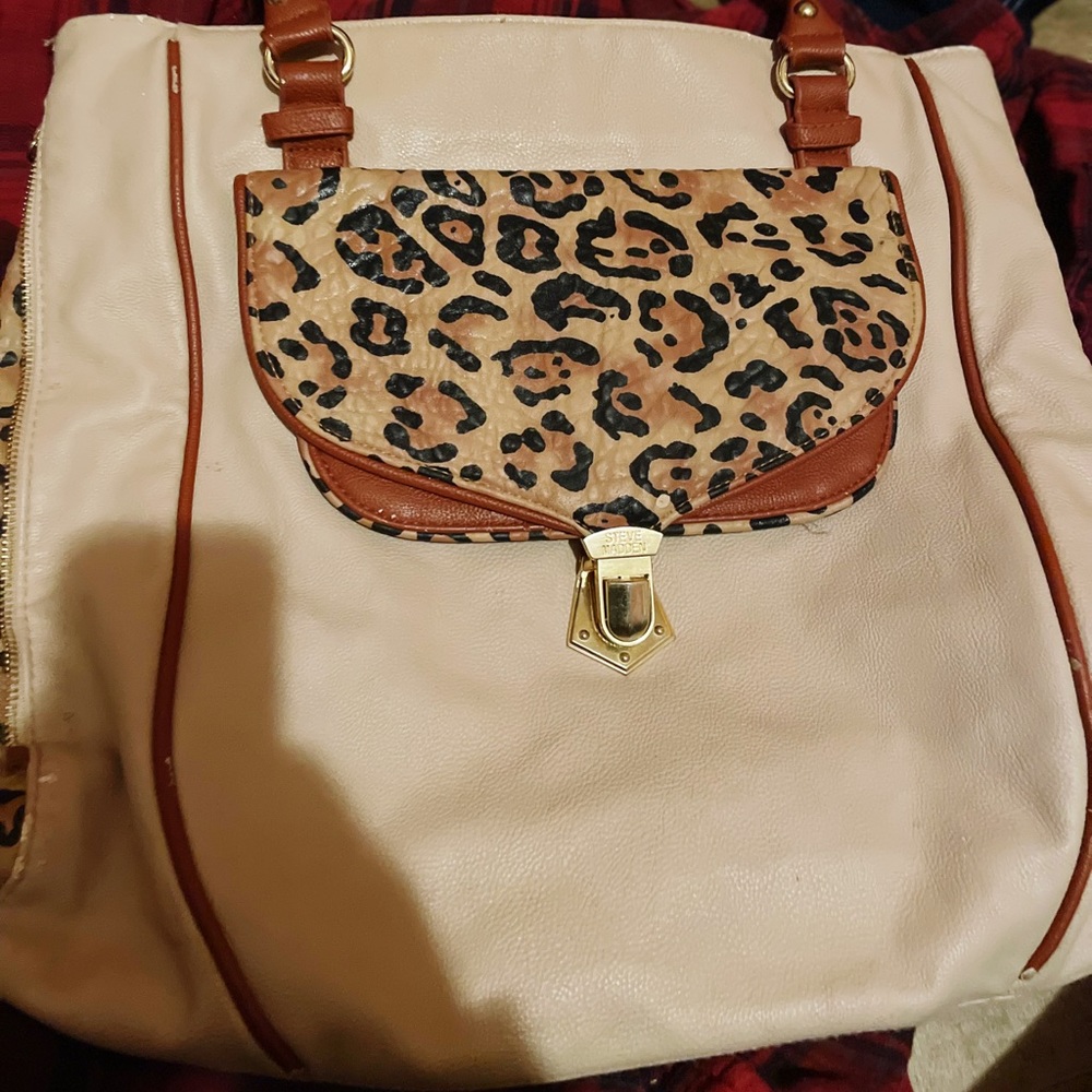 Steve Madden beige and black used.
